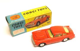 CORGI TOYS NO 218, an excellent bright boxed Red Aston Martin DB4 Sports with a vent on bonnet, (