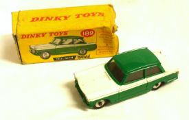 DINKY TOYS NO 189, a good boxed Green and White Triumph Herald Saloon, in a poor box (flap and