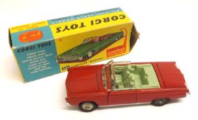 CORGI TOYS NO 246, a good boxed Maroon Chrysler Imperial Coupe complete with golf trolley (minute