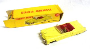 DINKY TOYS NO 131, a slightly playworn boxed Yellow Cadillac Tourer, in a reasonable correctly