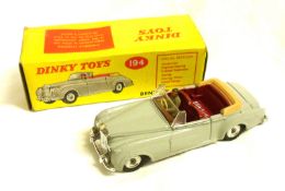 DINKY TOYS NO 194, a very good to excellent boxed Grey and Maroon Bentley S2 Coupe, in a very good