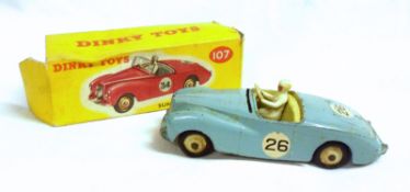 DINKY TOYS NO 107, a boxed playworn (windscreen missing) Blue Sunbeam Alpine Sports Car, in a poor