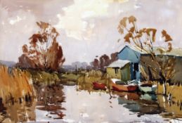* EDWARD WESSON (1910-1983) A NORFOLK RIVER SCENE WITH BOATS BY BOATHOUSES watercolour, signed
