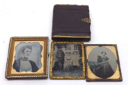 A collection of four Daguerreotype Pictures, including tinted group of two young children, half-
