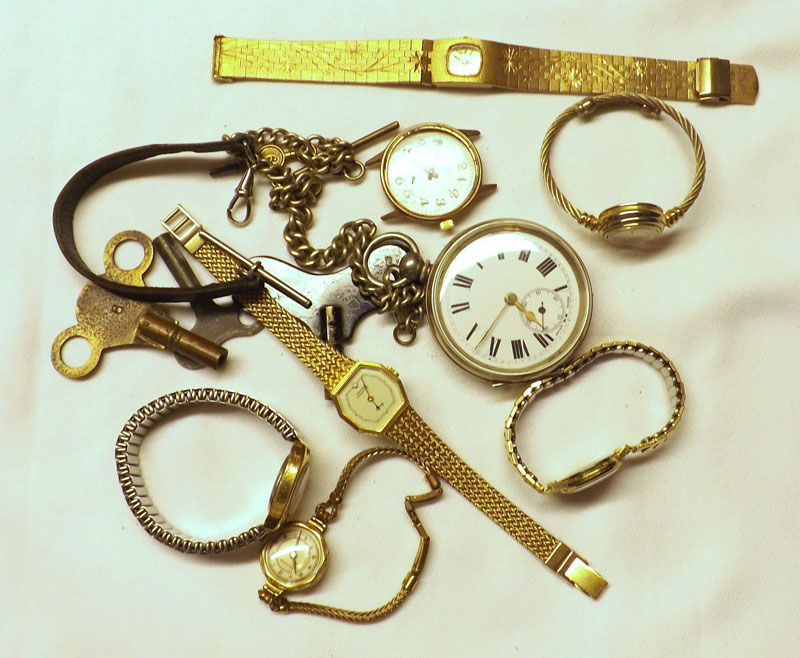 A Mixed Lot comprising:  A base metal cased open faced keyless Pocket Watch with curb link Watch