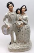 A large 19th Century Staffordshire Figure Group, Georg and Eliza Harris, decorated with gilt