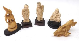 A small collection of three various early 20th Century Carved Ivory Figures, comprising a pair