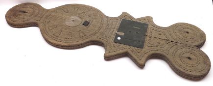 A primitive carved Oak combination Barometer and Sundial, of moulded form, with central carved