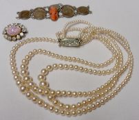 A Mixed Lot of a Pearl-type three strand Necklace, Brooch and Coin Bracelet (3)