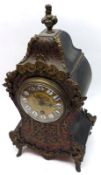 A late 19th Century French Faux Tortoiseshell and Brass Mounted Mantel Timepiece, the waisted case