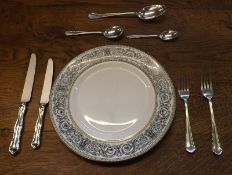 An 20th Century composite 6 person x 7 piece table setting of Dubarry variant cutlery. Comprising