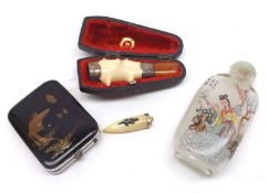 A Bone and Hallmarked Silver Mounted Amber Stemmed Small Cheroot Holder; a further Oriental Snuff