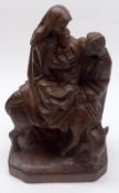 A 20th Century Middle Eastern Olive Wood Carved Figure Group of Mary, Joseph and the Baby Jesus,