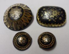 A Mixed Lot comprising: two Victorian Tortoiseshell Gold and Silver Piqué Work Brooches; together