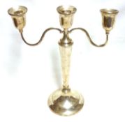 A Queen Elizabeth II Three Light Candelabra, of typical form with tapering stem and spreading