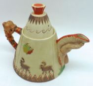 A Clarice Cliff Newport Pottery Novelty Teapot, Greetings from Canada, the spout formed as an Indian