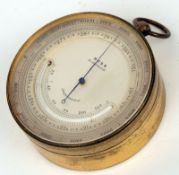 A late 19th/early 20th Century Gilt Brass Travelling Combination Barometer, Altimeter and