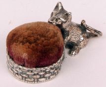 An early 20th Century white metal or plated Novelty Pin Cushion, in the form of a kitten by