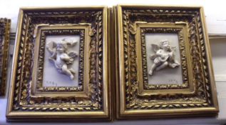 A pair of Reproduction Composition Plaques depicting musical putti, 6” x 4 ½”