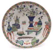 A Chinese Circular Plate, the centre painted in underglaze blue and famille verte and iron red