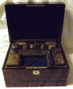 A 19th Century Coromandel Dressing Table Box, the top inlaid with vacant mother-of-pearl