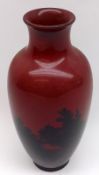 A Royal Doulton Flambé wide necked Vase, decorated with a continuous rural scene with cottage