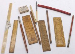 A Box containing a collection of Vintage Wooden Rulers, assorted Pencils etc