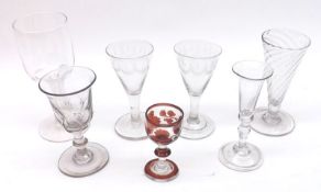 A collection of seven 19th Century and later Glasses, comprises a pair of small conical Wine