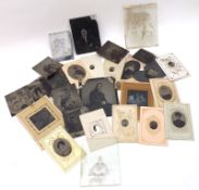 A Box containing a collection of various Daguerreotype and Tin type unframed family groups,