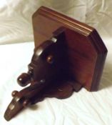 A Mahogany Wall Bracket of canted rectangular form, 9” wide