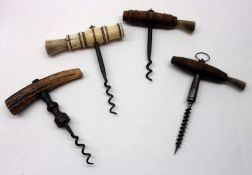 A Mixed Lot: four assorted Vintage Corkscrews to include horn and bone-handled examples