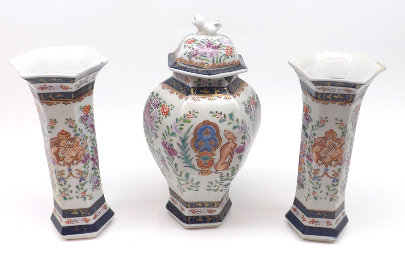 A Samson Three Piece Garniture, comprising a Lidded Baluster Vase and a pair of matching Trumpet