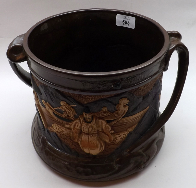 A large Bretby double-handled Jardinière, decorated with a continuous design of Oriental figures and