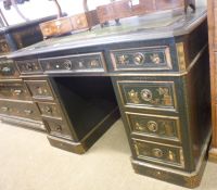 A late 19th Century Japanned and Lacquered Twin Pedestal Writing Desk, with central tooled green