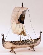 A 20th Century David Andersen Norwegian Sterling Model of a Viking Sailing Boat, raised on
