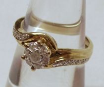 A hallmarked 9ct Gold all small Brilliant Cut Set Diamond Cluster Ring of flower head crossover