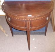 A 19th Century Small Demi-Lune Side Table, with a boxwood and ebonised hatched strung top over two