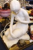 A 20th Century Marble Table Lamp formed as a Grecian kneeling maiden on a brass base, 17” high