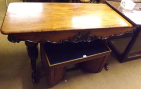 A William IV or early Victorian Rosewood Two-Drawer Library Table, raised on two pedestals with