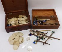 A small Oak Box containing a selection of various Lace Making Bobbins, together with a box of