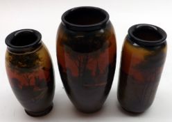 A group of three Doulton Burslem/Royal Doulton small wide-necked Vases, decorated with rural