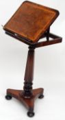 A Regency period Rosewood and Mahogany Lectern, raised on spreading hexagonal column support with