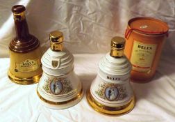 Four empty Wade Decanters