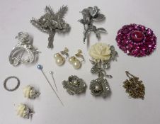 A packet containing mostly Marcasite floral design Brooches