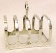 A George VI Small Four Slice Toast Rack of typical form, Sheffield 1939, weight approx 1 ½ oz