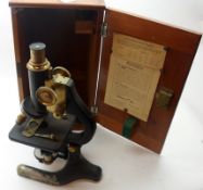 A 2nd quarter of the 20th Century Mahogany Cased Monocular Microscope, Charles Perry, 41 North Holme