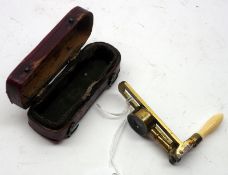 A 19th Century morocco cased Pocket Specimen Magnifier, the baluster turned ivory handle hinged to a