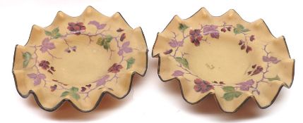 A pair of 19th Century Frilled Glass Bowls, decorated with floral sprays on an opaque background,