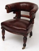 An early 19th Century Mahogany Brown Leather Upholstered Bow Back Library Chair, plain centre rail