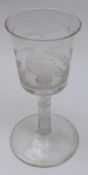 A decorative 18th Century style Wine Glass, the cylindrical bowl with flared rim and well-engraved